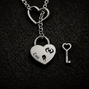 Silver heart padlock necklace engraved "Evie" with the BDSM Switch symbol and genuine working lock, for switches and dual-role D/s identity, FETBOMB