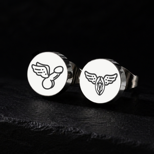Silver winged penis and winged vagina stud earrings on a black background, explicit fetish jewellery in 12mm stainless steel from FETBOMB.