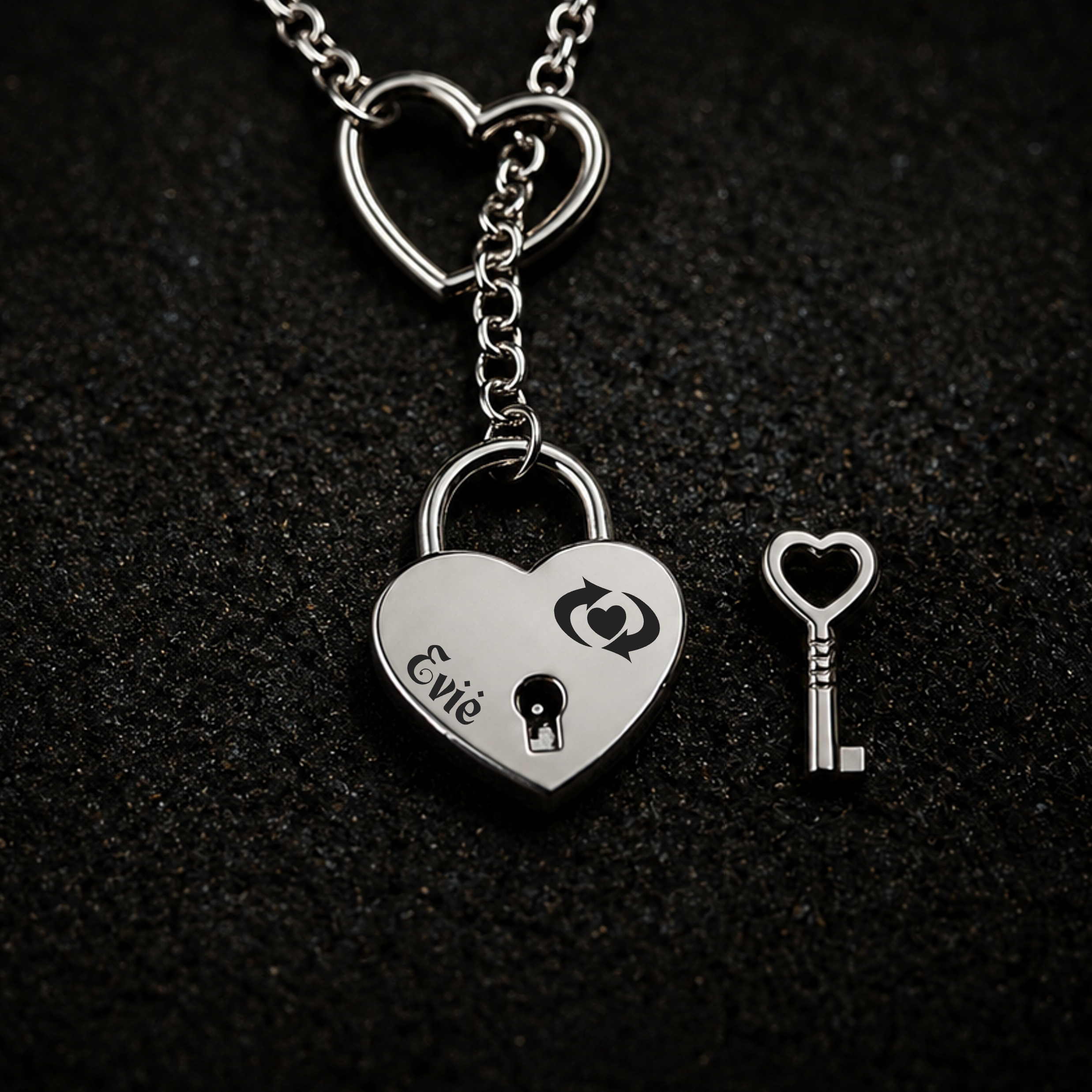 Silver heart padlock necklace engraved "Evie" with the BDSM Switch symbol and genuine working lock, for switches and dual-role D/s identity, FETBOMB